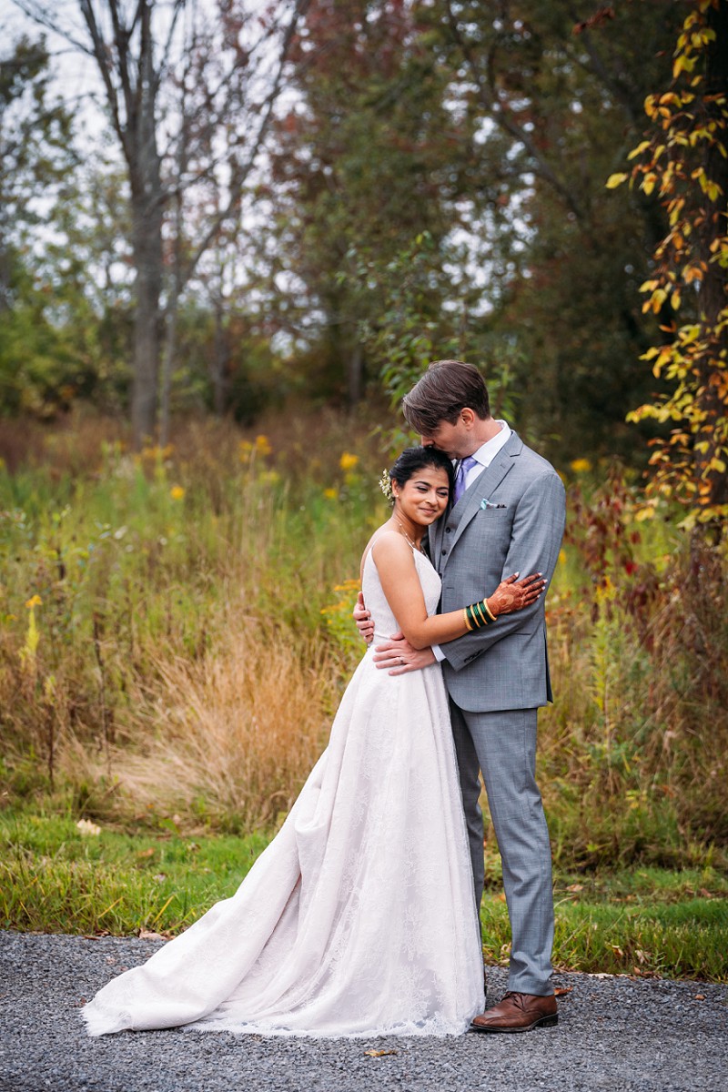 bride and groom embracing